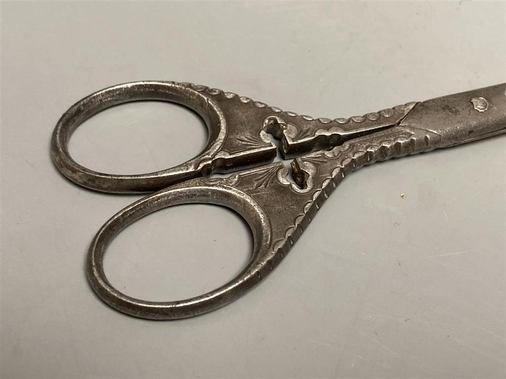 A pair of 18th/19th century Ottoman brass and steel calligraphers scissors with engraved decoration and three other pairs of scissors